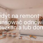 A modern living room under renovation, with paint cans, tools, and a blueprint, bright and clean atmosphere, realistic.